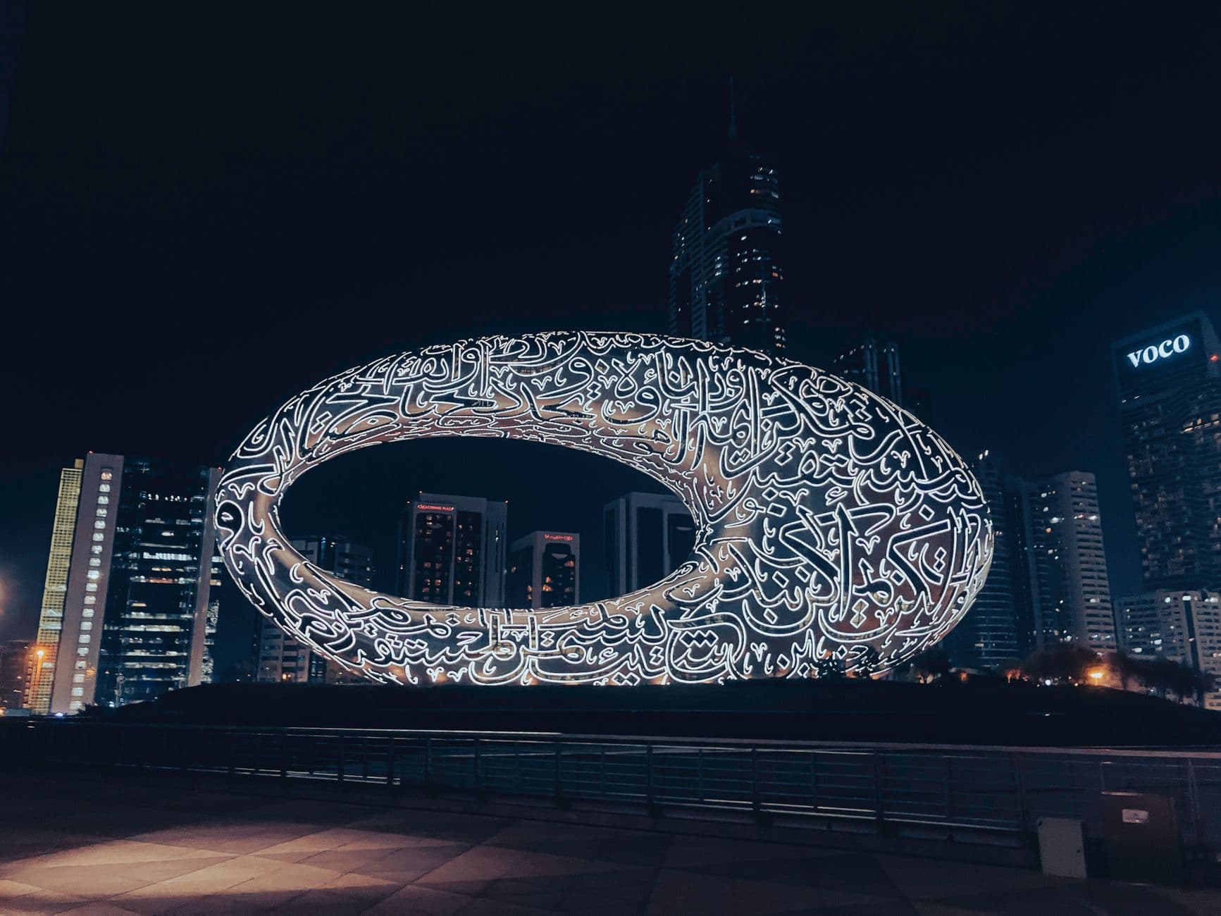 Stunning night view of the Museum of the Future in Dubai, showcasing its unique architecture and vibrant lighting.