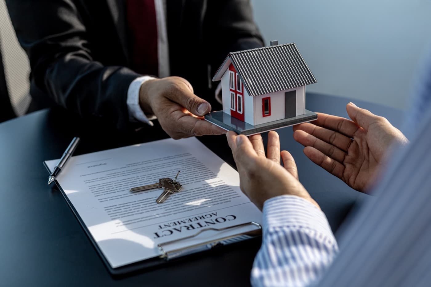 Advisor discussing a property mortgage with clients